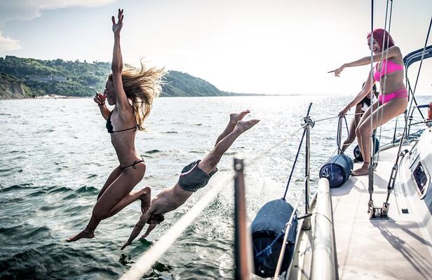 Mykonos Catamaran Cruise with Meal Drinks and Sup