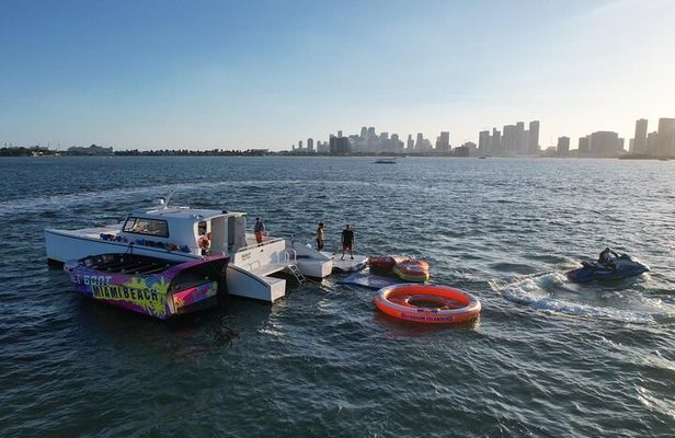 Aquatic Adventure: Boat Tour with Jetskis, Tubing, and Open Bar