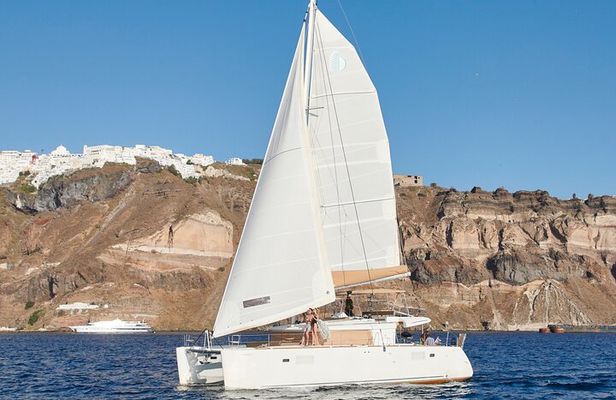 Santorini Gold Catamaran Cruise with BBQ, Drinks and Hotel Pickup
