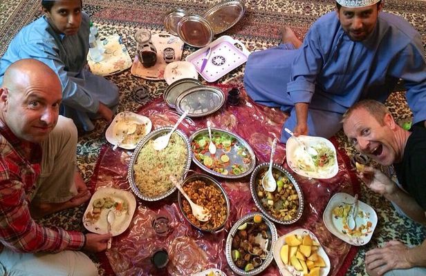 Group Dinner at Omani Home Dining Experience with Transfer