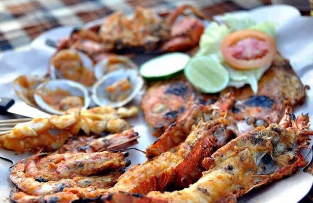 Romantic Seafood Dinner under sunset jimbaran Beach