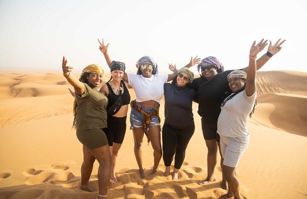 Dubai Half-day Red Dunes bashing with Sandboarding, Camel &Falcon