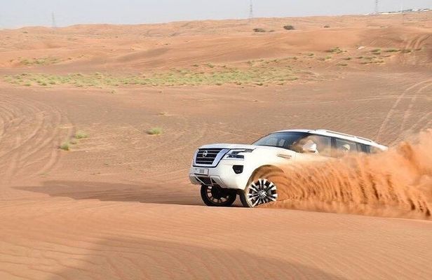 Private Morning Desert Safari with Camel Ride & Sandboarding