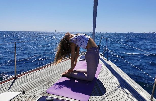 Yoga Session and Sailing Adventure in Barcelona
