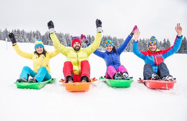 Snow day on snowmobiles, snowshoe hike and culipatín