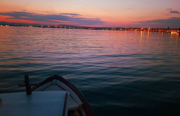 Sunset boat tour with aperitif and swimming break