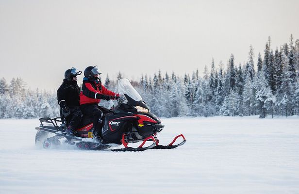 Two hours Snowmobile Safari Driving into Lappish Forests