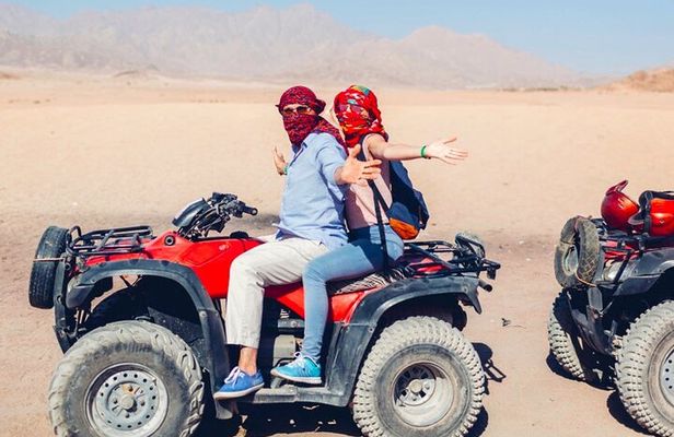 Ride into the Sunset Quad Biking Desert Safari Experience