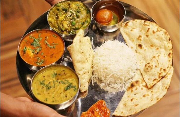 Cooking class & meal (Indian Food) with local family in Jaipur.