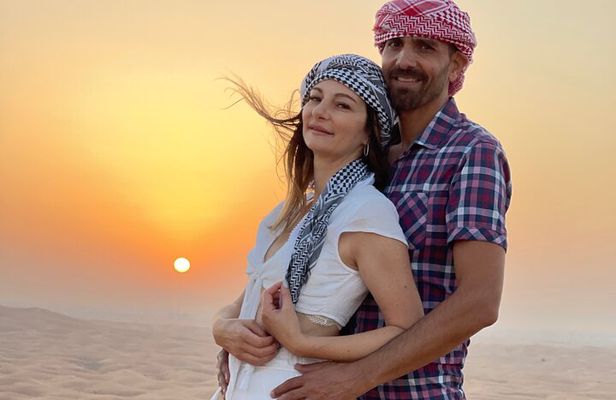 Sunrise Desert Safari with Sand Boarding and Camel Ride