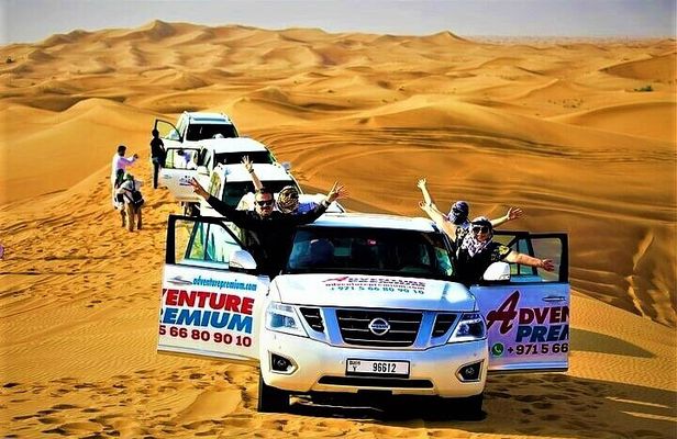 Dubai Red Dunes Camel Safari with Sand boarding, Dune Bashing & BBQ