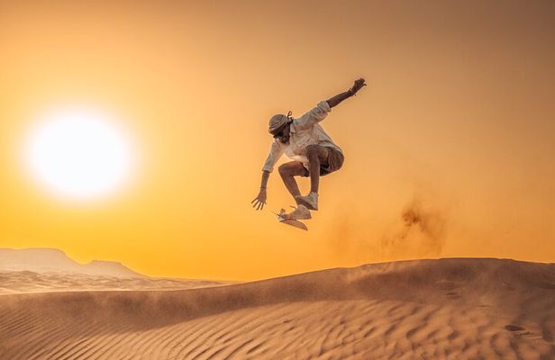 Private Sunset Desert Safari:SandSurfing, Camel Ride & BBQ dinner