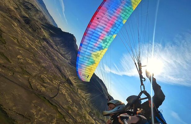 Tandem Paragliding over the Rugged Lava Fields at Blue Mountains