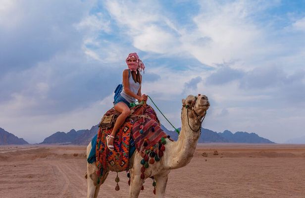 Riding a Camel West of Luxor