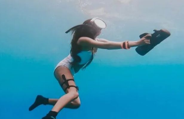 Snorkeling with underwater scooter in Taha’a lagoon from Raiatea
