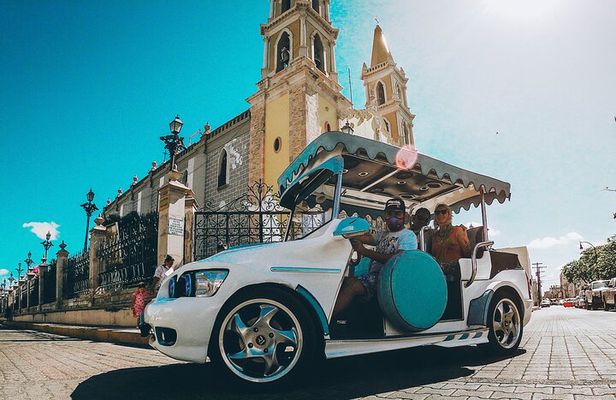 Mazatlan City Tour by Traditional Open Air Vehicle Pulmonia
