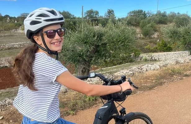 Alberobello in e-bike. Trulli, countryside, mill and donkeys
