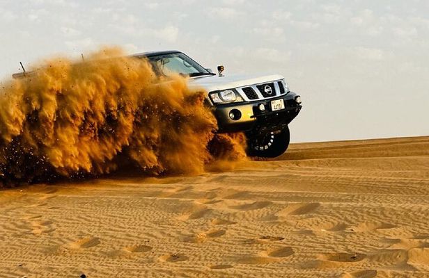 Desert Safari Dubai BBQ Dinner, Camel Ride & Dune Bashing