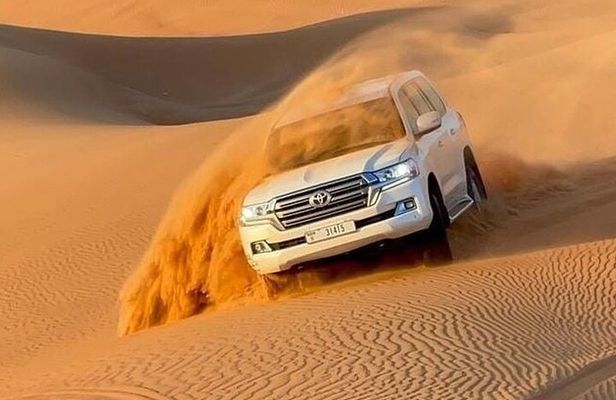Desert safari Dubai with BBQ Dinner, Camel Ride, Dune Bashing