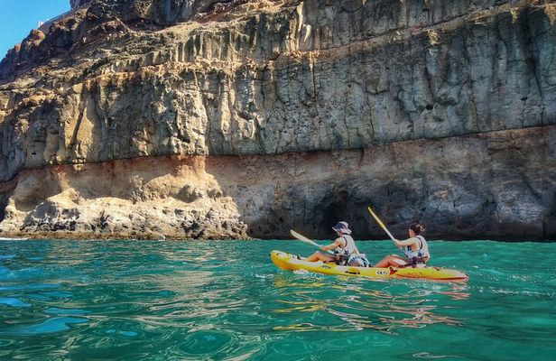 Kayak around the Mogan Caves and Cliffs