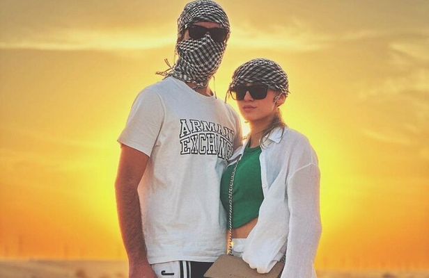 Private Morning Safari Camel Ride, Dune Bashing and Sandboarding