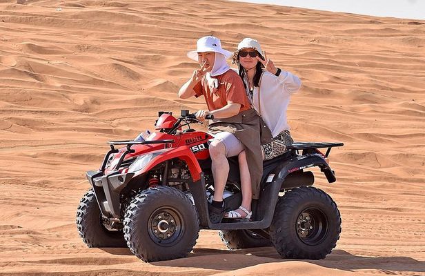 Dubai Desert Safari Tour with Quad Bike, Camel Ride & BBQ Dinner