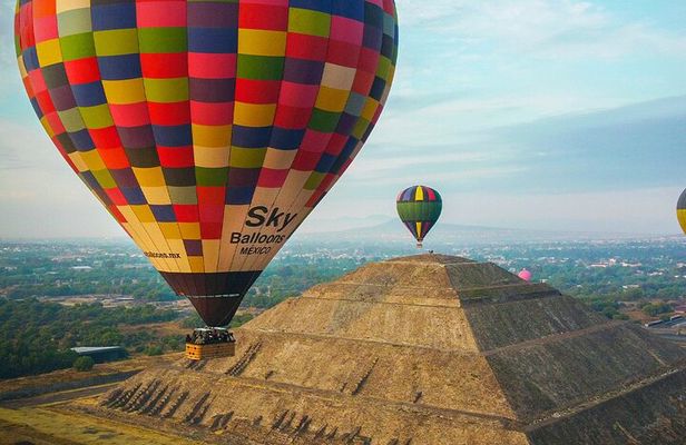 Balloon adventure: transfer+breakfast in the cave+guided pyramids