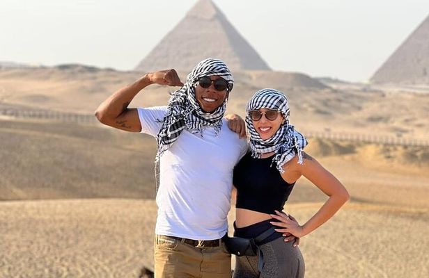 Half Day private guided tour Giza Pyramids,Sphinx,lunch,camel rid