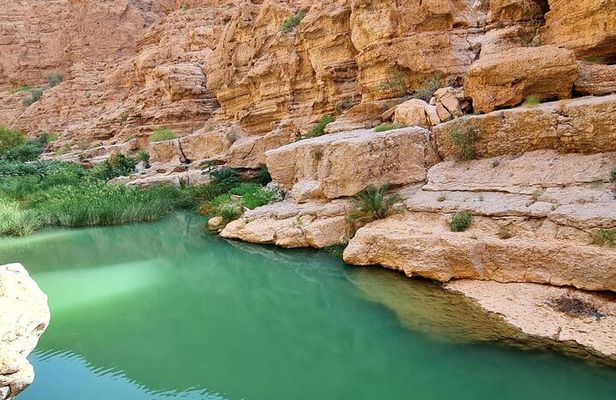 Full Day Group Tour to Wadi Shab Bimmah Sinkhole and Fins Beach