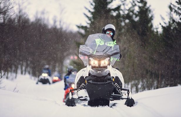 Midday Snowmobiling in Camp Tamok with Guide