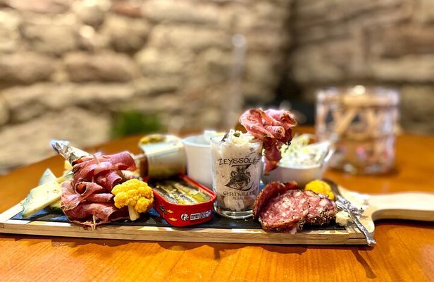 Immersive cellar tour, tasting and board meal