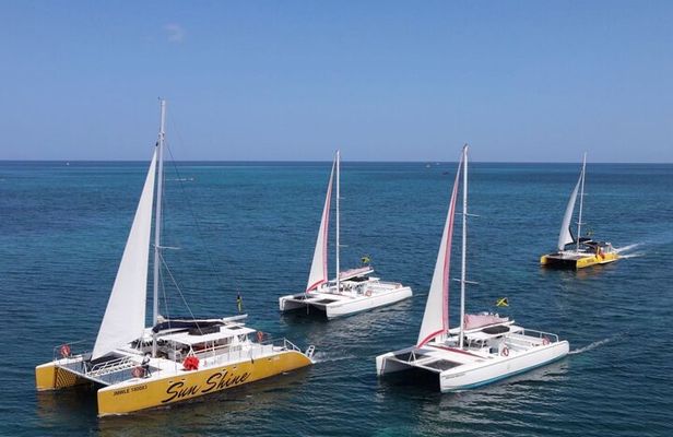 Negril Sunset Catamaran Cruise with Snorkeling and Rick's Cafe