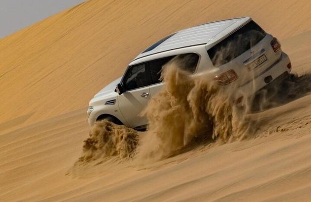 Doha Half Day Desert Safari Dune Bashing Camel Ride Sandboarding