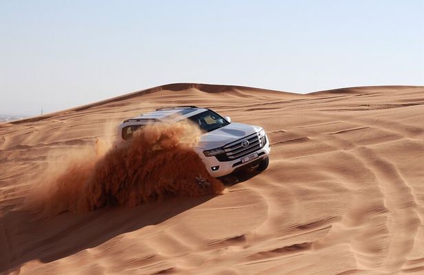 Dubai Sunset Red Dune Desert Safari, Sandboarding and Camel Ride