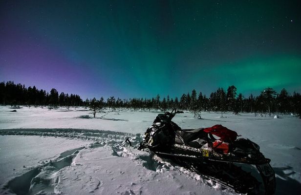 Evening Snowmobile Safari with Campfire in Saariselkä