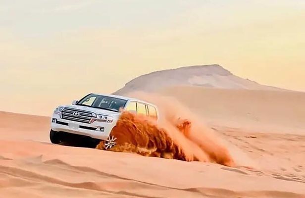 Desert Safari With BBQ Dinner, Quad Bike & Camel Ride from Dubai
