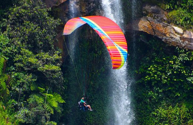 Paragliding and hammocks zipline over waterfalls private tour