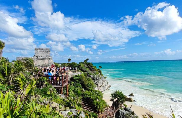 Half-day Tulum ruins and cenote swim arrive before the crowds