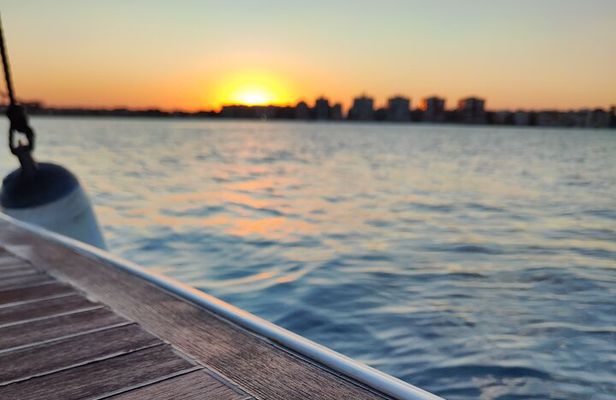 Sailing with sunset and swimming in the sea