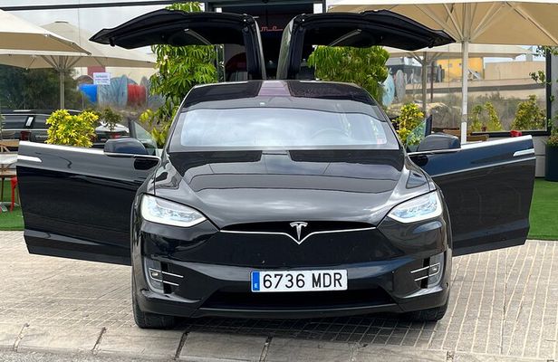 Visit the Motor Museum in a TESLA