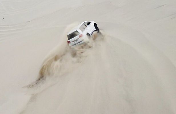 Private Night Desert Safari Dune Bashing and Camel Ride in Doha