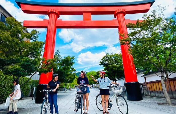 Pedal Adventure Kyoto's iconic landmarks on an e-bike tour