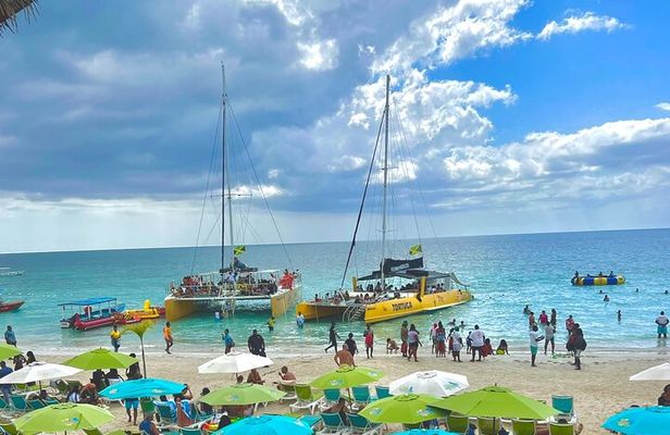 7 Mile Beach Party Catamaran Cruise with Snorkeling & Ricks Cafe 