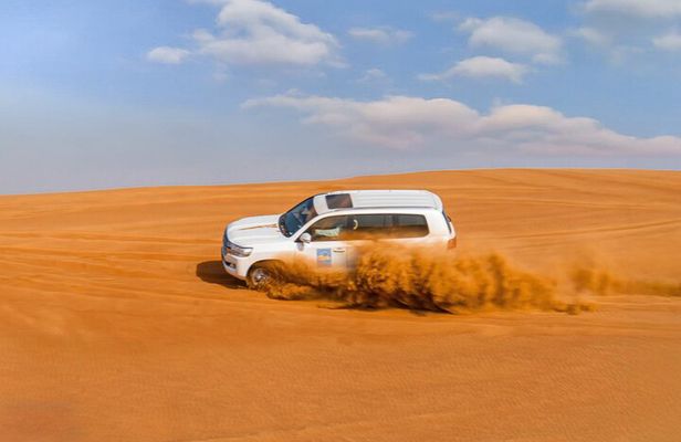 Premium Red Dune Safari with Camel Ride and BBQ in Arabian camp