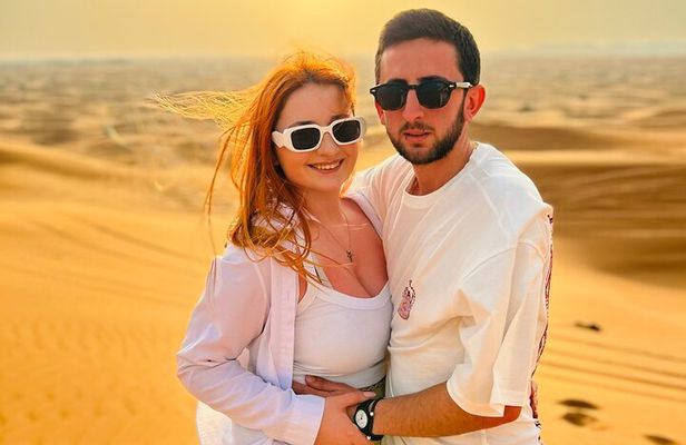 Dubai Dune Bashing Tour with Quad Bike, Sandboarding, Camel Ride