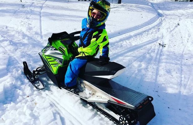 Lapland Winter Park Mini snowmobile fun for kids in Rovaniemi