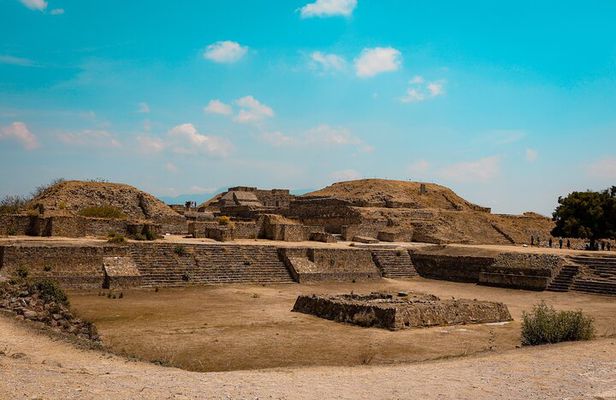 Monte Albán archaeological site in Oaxaca Mexico with stone platforms, pyramids and mountain views