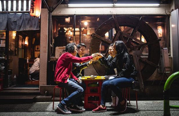 Shibuya by night in Small Groups: Neon Lights and Local Flavors
