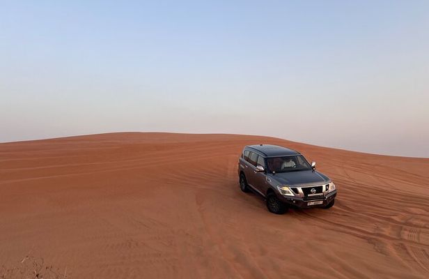 Evening Desert Safari, Camel Ride, Sand Boarding & BBQ Dinner 