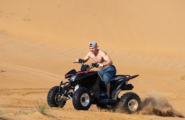 Desert Safari Quad Bike and Camel Experience with BBQ Dinner